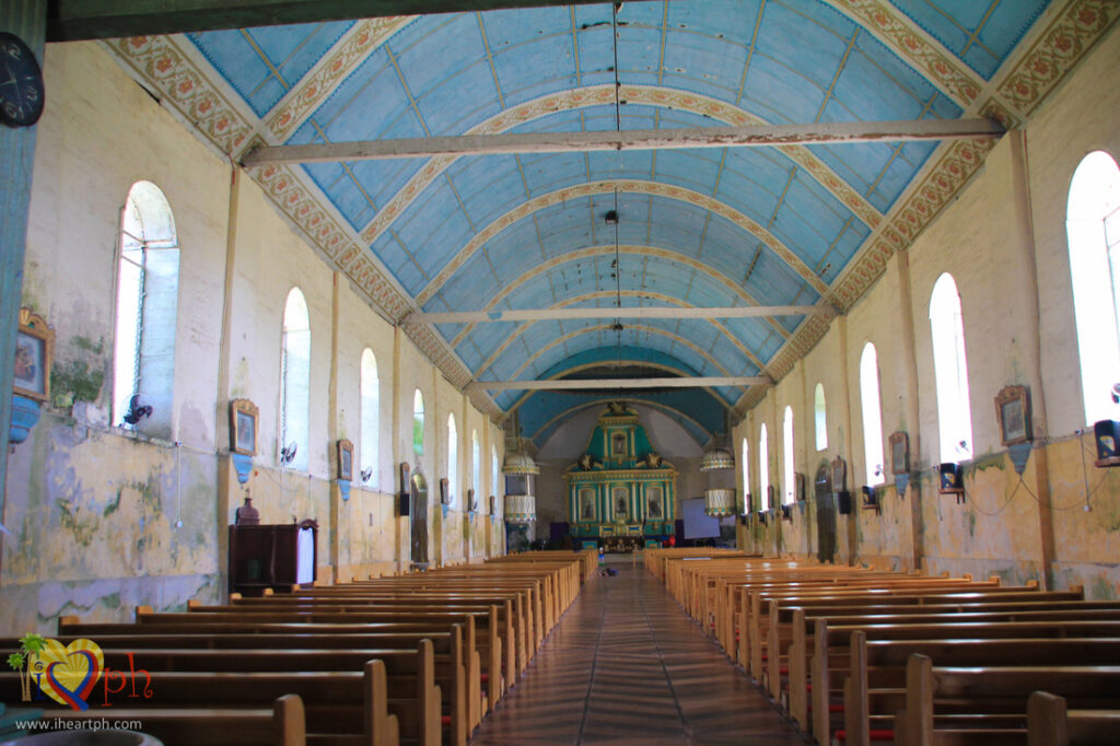 The altar with San Isidro Labrador and the two old pulpits of the Lazi Church in Siquijor Philippines