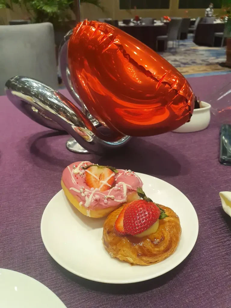 Sweet pastries for breakfast in the breakfast buffet of Shangrila Hotel The Fort