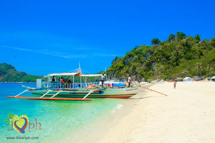 Day tour travellers visiting Antonia Beach in Isla de Gigantes Philippines