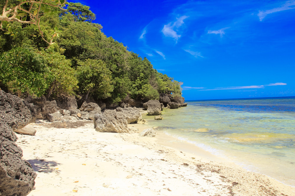 Kagusuan Beach is a haven of pure white sand and limestone rocks located in Siquijor Philippines